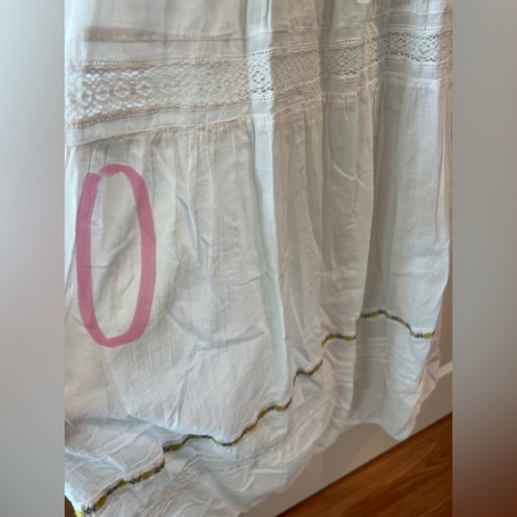 THE GREAT. The Clover Smocking Sleeveless Embroidered Floral Mid Dress - Picture 6 of 16